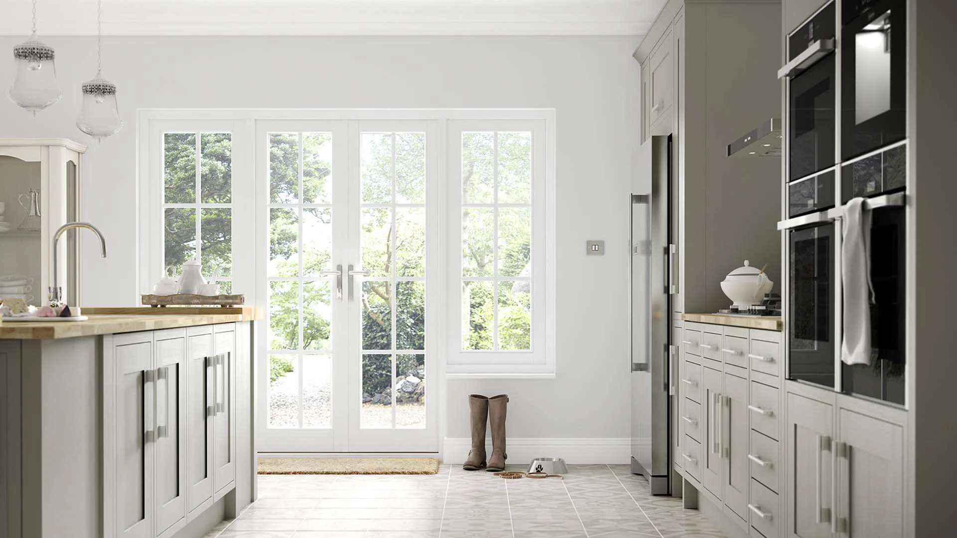 Grey kitchen with large windows and white doors