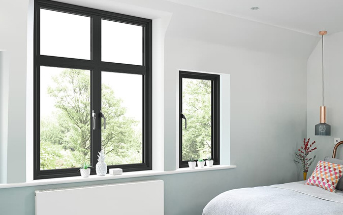 Bedroom with modern black aluminium windows