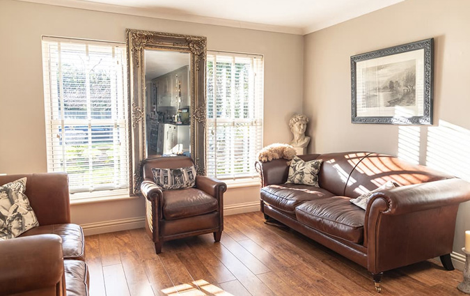 Living room with uPVC sliding sash windows