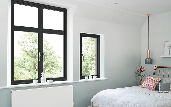 Slimline aluminium windows in a bedroom