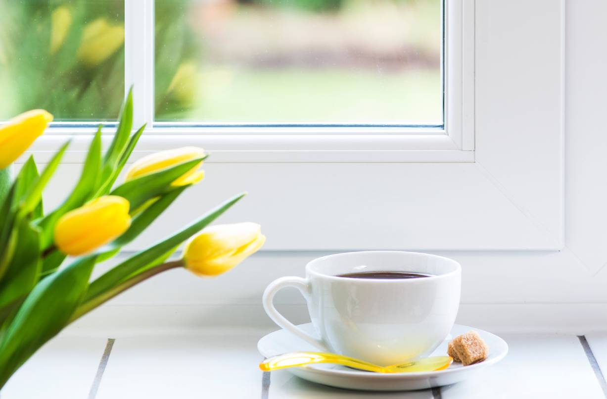 A white uPVC double glazed window with tilt and turn opening