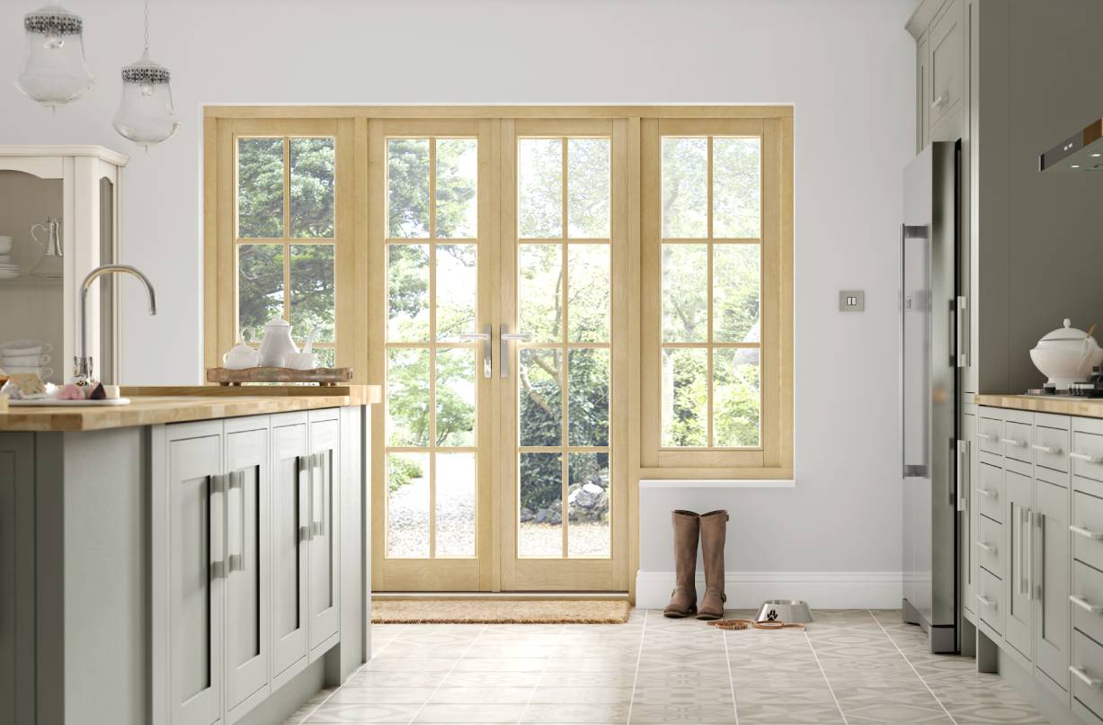 Wooden French doors with glazing and side panels