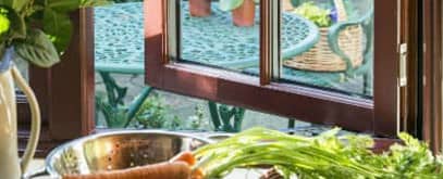 Close up of a brown Everest casement window in a kitchen