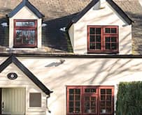 Brown Everest timber casement windows on a cottage