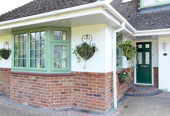 Stunning uPVC bay windows in chartwell green