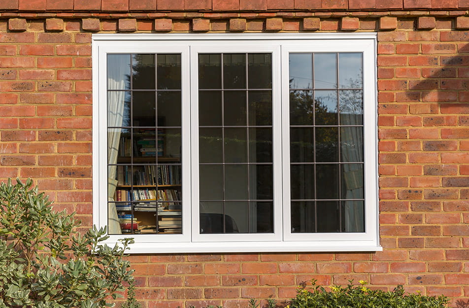 White Aluminium windows with leaded glass