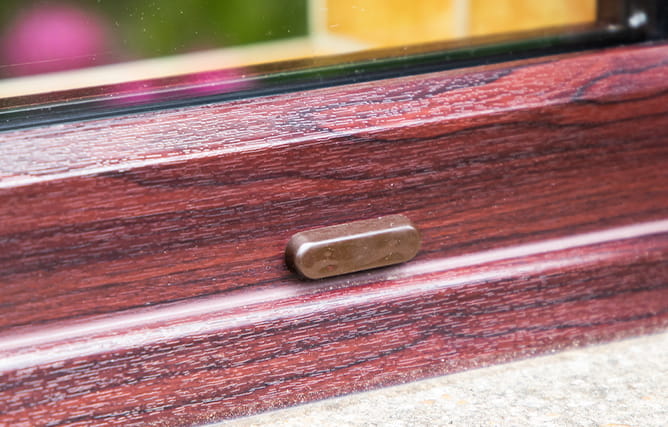 Close up of the rosewood finish on Everest uPVC windows