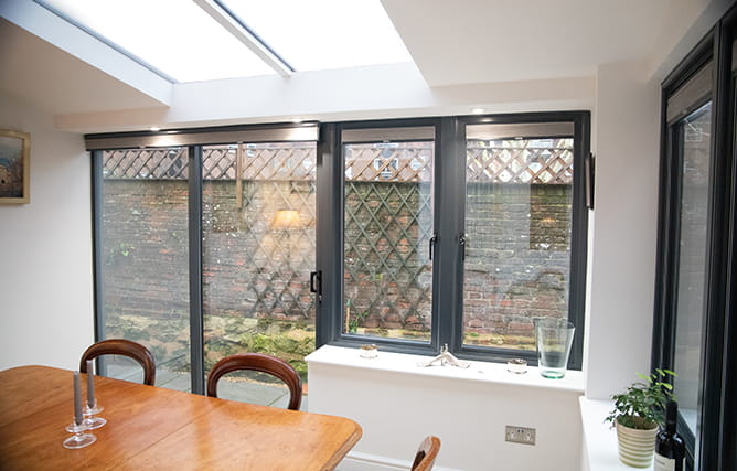 An extension with aluminium double glazed windows and a aluminium sliding patio door