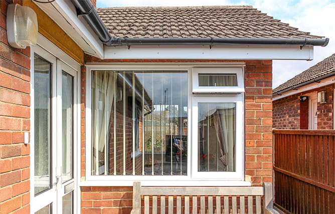 White uPVC casement window open from outside