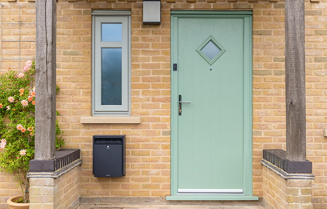 A composite front door in chartwell green