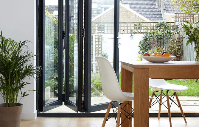 Fully open bifold doors in anthracite grey