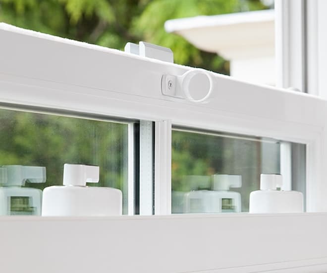 Close up of an Everest white uPVC window which adheres to Secured by Design