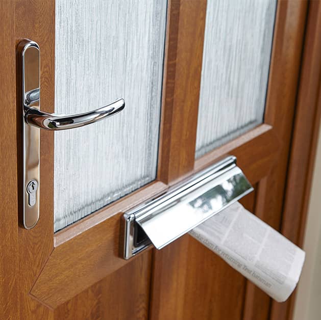 Golden oak uPVC front door with glazing panels