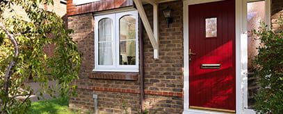 Property with a red front door