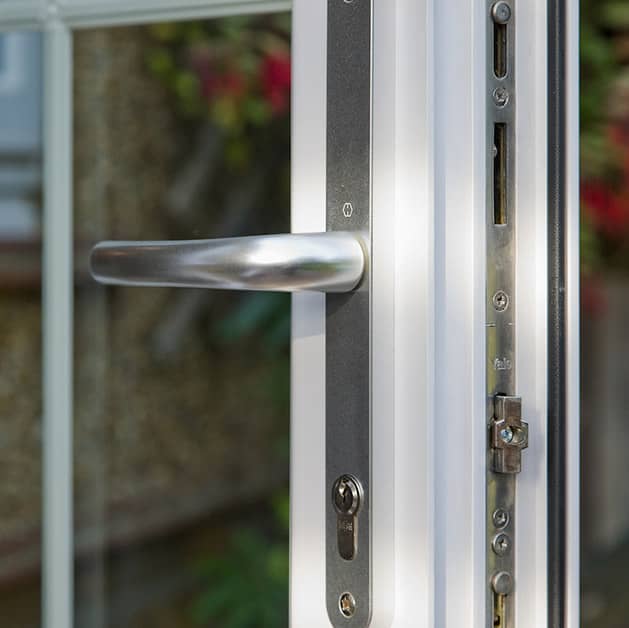 Chrome handle on a white uPVC back door