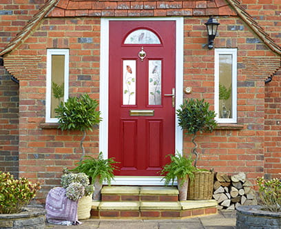 An open red composite front door