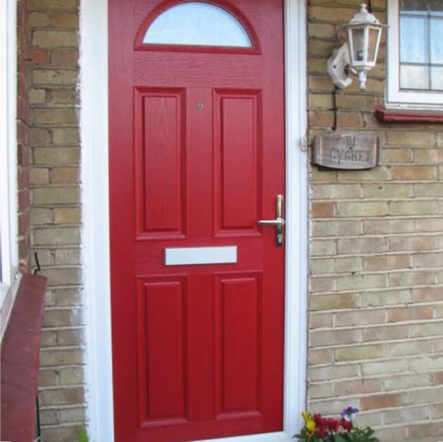 Front entrance door in striking red