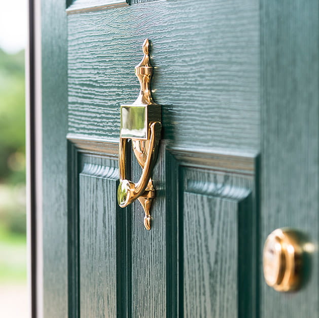 Gold furniture on a green composite door