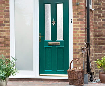 Green front door with half panel glazed