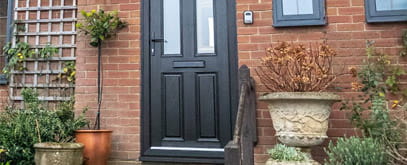 Black front door and matching window frames