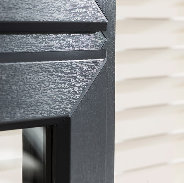 Anthracite grey woodgrain effect on uPVC windows