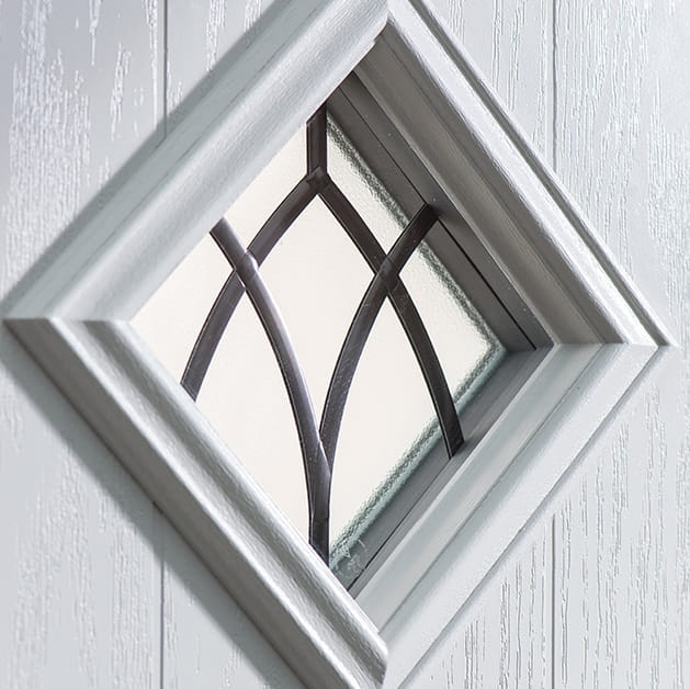 Diamond glazing panel with decorative glass