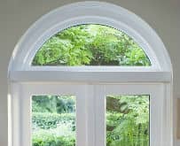 Timber French doors with arched window