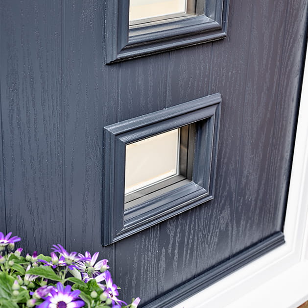 Glazing panel on an anthracite grey entrance door