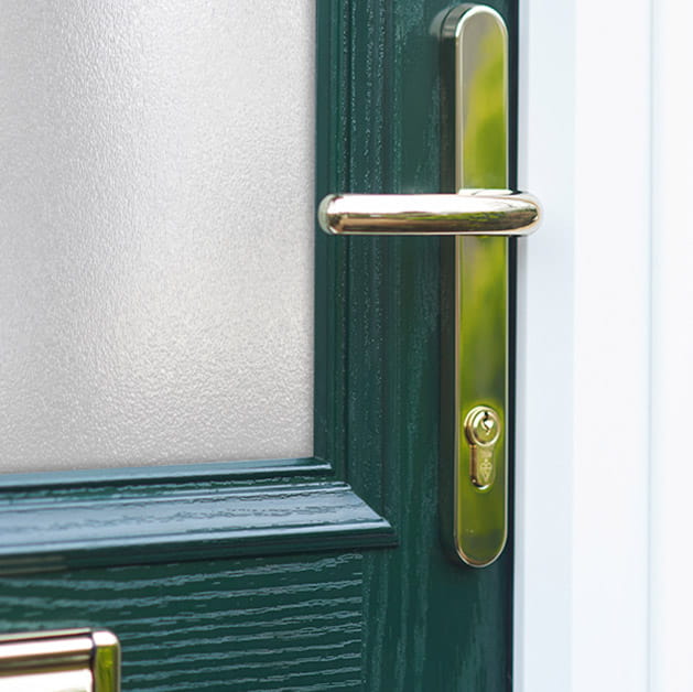 Green front door with half panel glazed