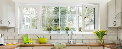 Close up of a white Everest uPVC tilt and turn window in a kitchen