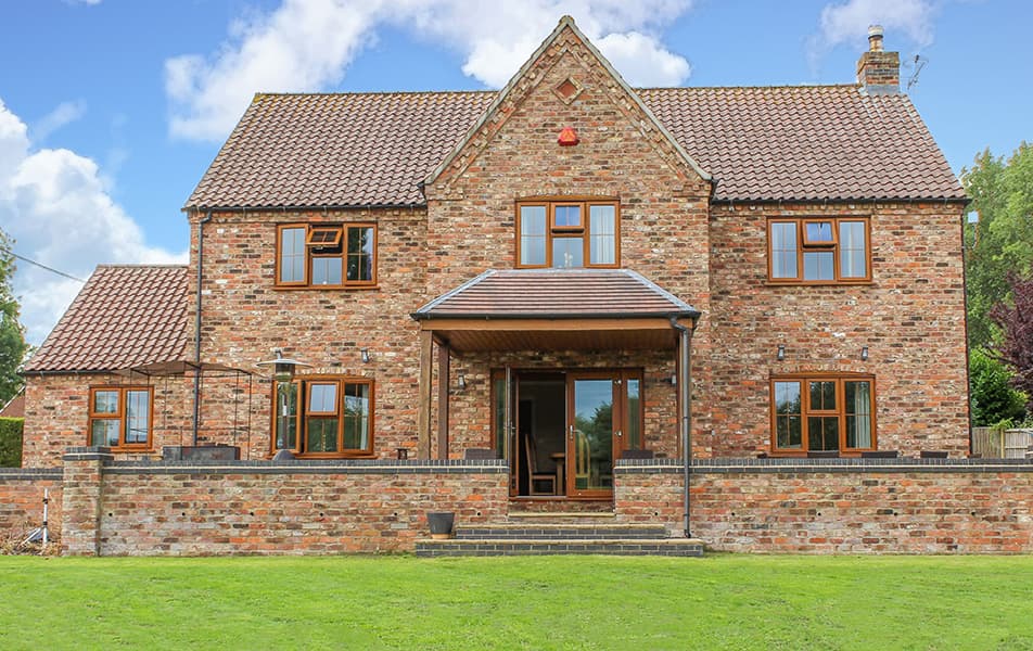 Everest timber windows, entrance and patio doors on a house