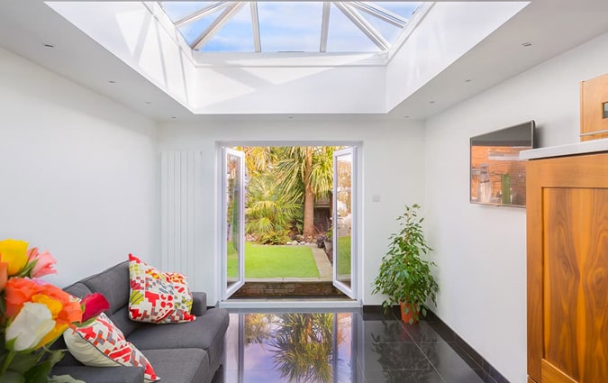 A modern extension with a glass lantern roof