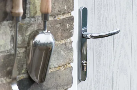 Chrome door handle on white Everest conservatory door