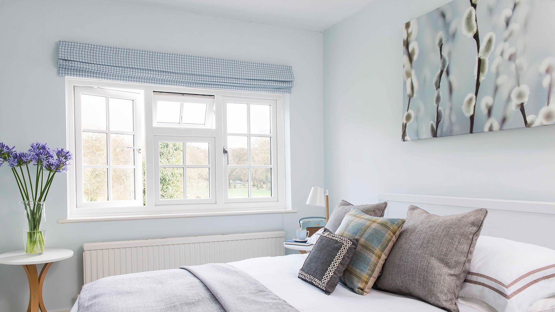 Light blue checkered window blinds light pastel bedroom