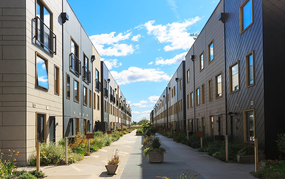 Modern apartment buildings with landscaped walkway