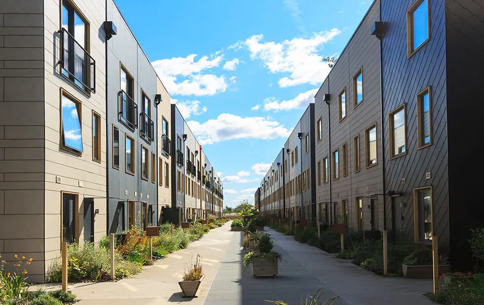 Modern apartment buildings with landscaped walkway