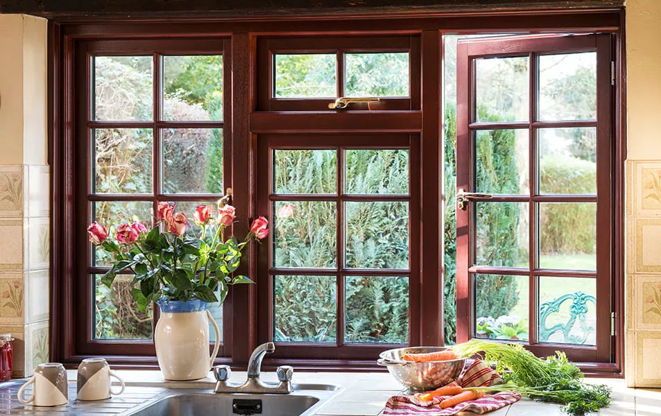 Everest conservatory window with dark red frame