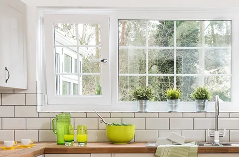 White Everest conservatory window with divided panes