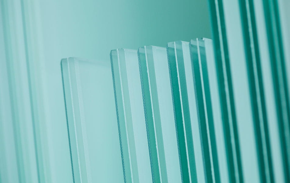 Stacked light teal glass panels