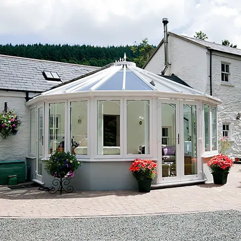 White Everest conservatory with glass roof and windows