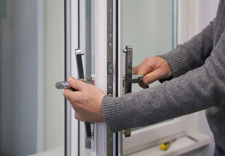 Person opening Everest conservatory door handle