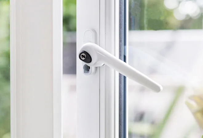 White window handle on an Everest conservatory