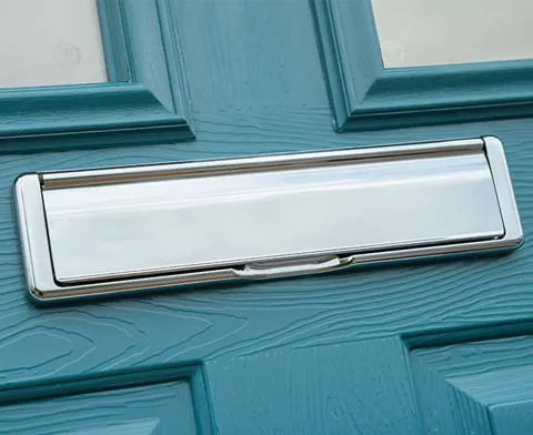 Teal Everest conservatory door with chrome letterbox