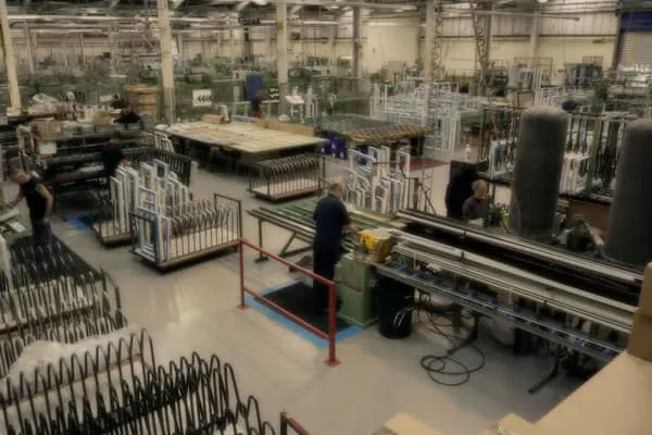 Everest factory workers assembling windows