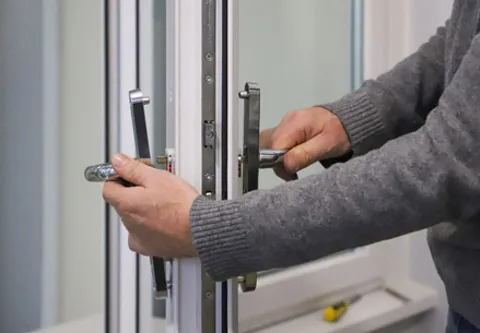 Person opening Everest conservatory door