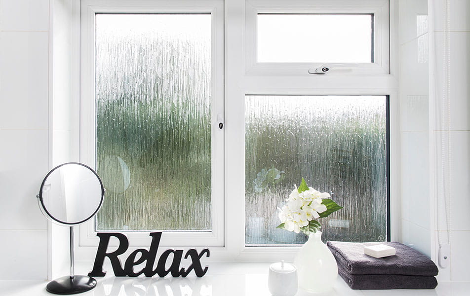 White window with frosted glass and Relax sign