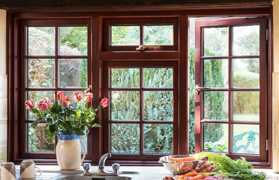 Everest conservatory window with open section showing garden view