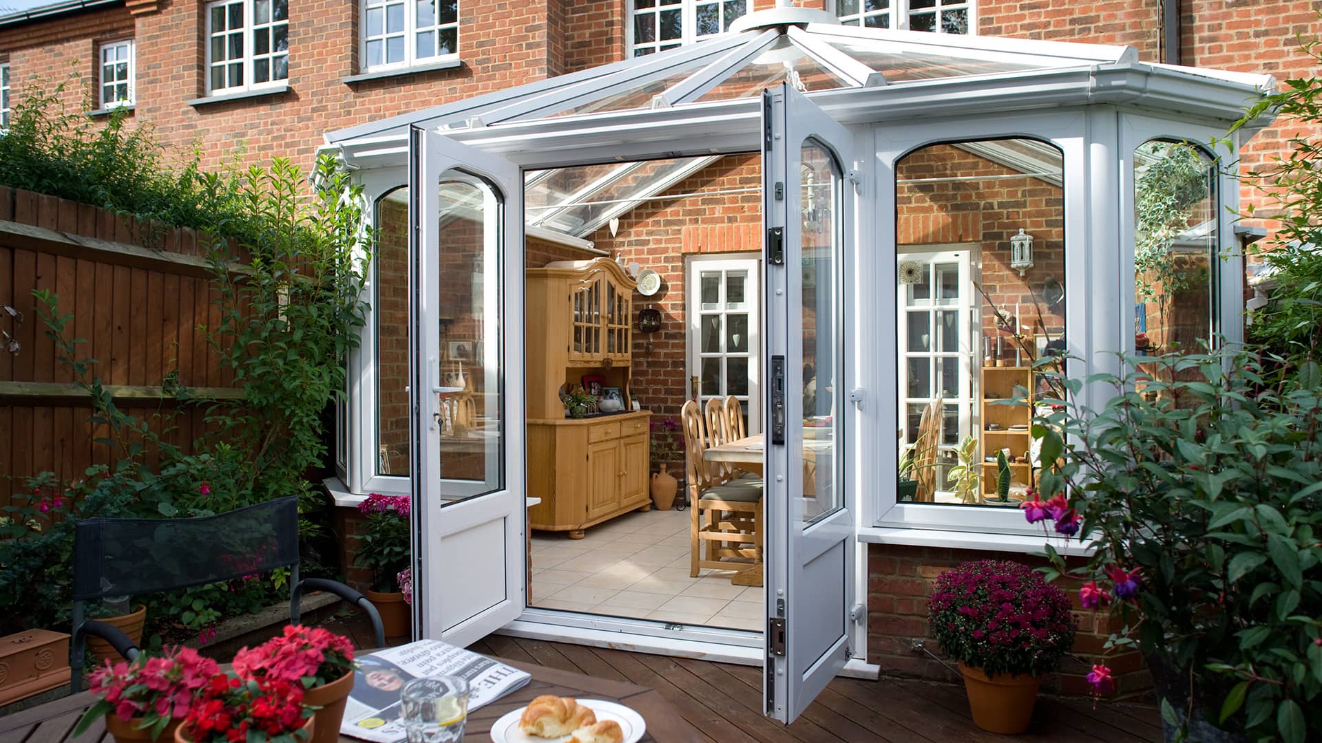 White Everest conservatory with open doors