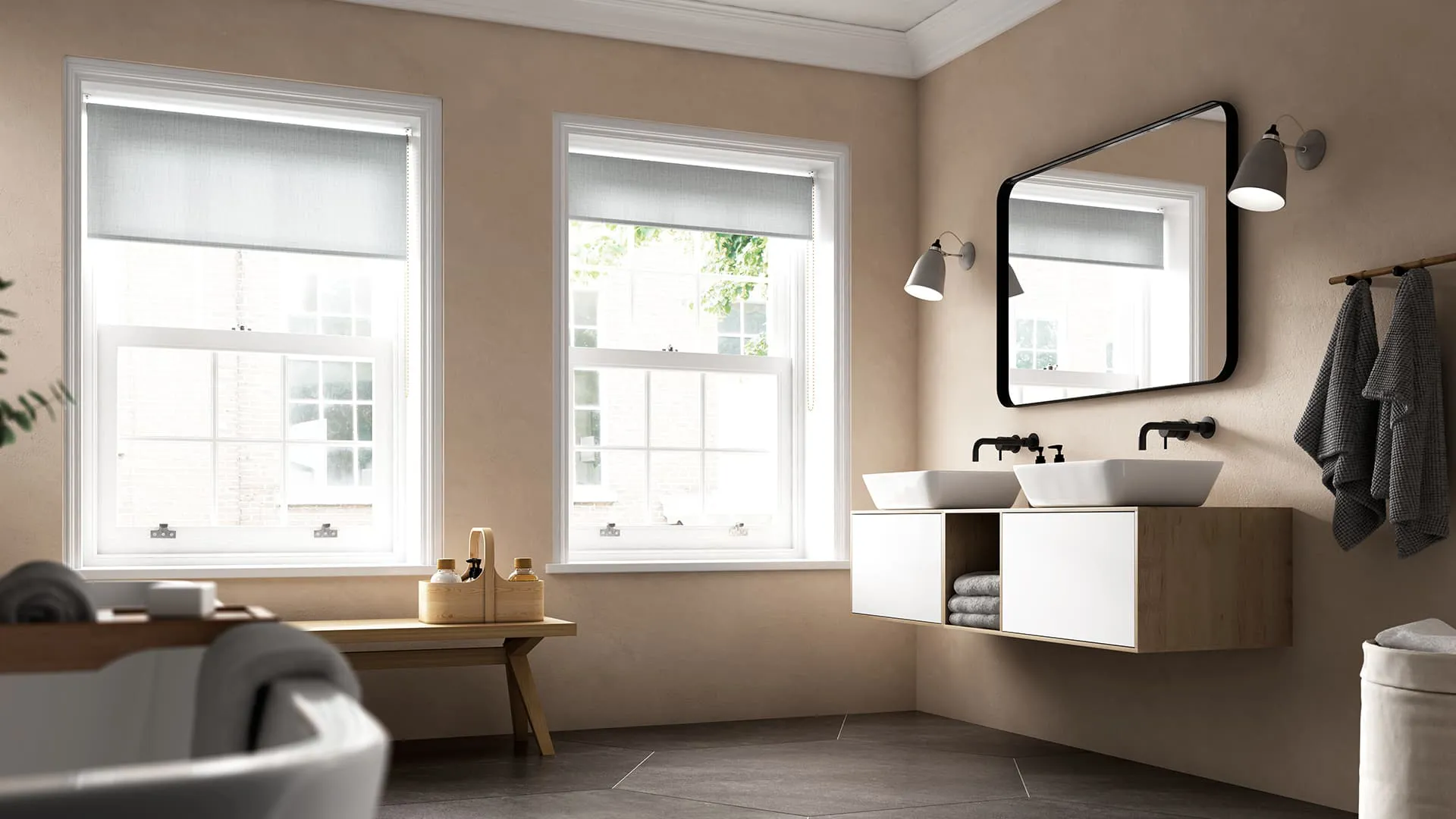 Bathroom with light beige walls light grey roller blinds and white windows
