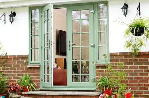 Sage green Everest conservatory double doors open
